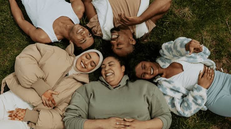 Representative image of a diverse community resting together
